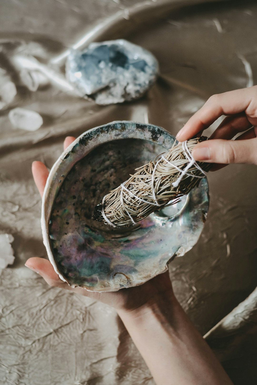 Abalone shell and a pine smudge stick during a smudging ritual ✦ Snag more FREE stock photos each month 👉 https://contentpixie.com/secret-snaps/